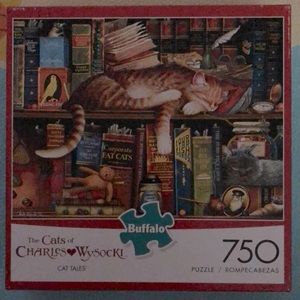 Charles Wysocki 750 piece puzzle called “Cat Tales”.